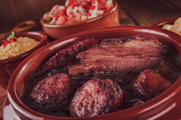 Brazilian feijoada with smoked pork ribs, loin and sausage