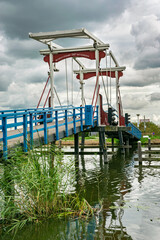 Scenic drawbridge over river Rotte, close to Rotterdam, Holland