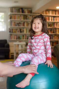 Little kid on exercise ball