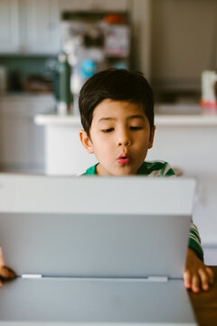 Little kid learning on computer