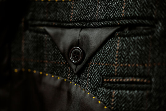 detail of a gray man suit