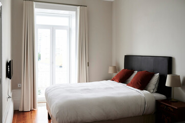 Boutique hotel double bedroom ready for guests