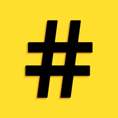 Black Hashtag icon isolated on yellow background. Social media symbol. Modern UI website navigation. Long shadow style. Vector.