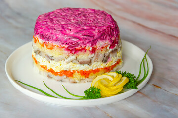 Salad “Herring under a fur coat”
This salad is popular in Russia and Ukraine.
