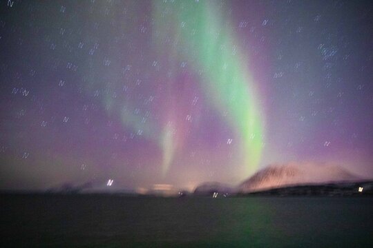 Northern light view from moving ship