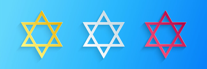 Paper cut Star of David icon isolated on blue background. Jewish religion symbol. Paper art style. Vector.