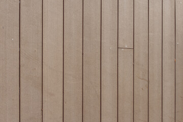 Background of vertical wooden planks. Fence, floor.