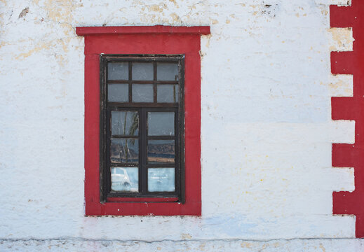 Old Window On Red Wall