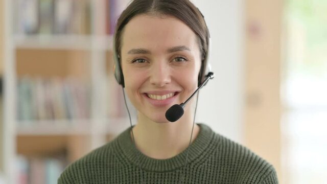 Call Center Woman Smiling at the Camera, Headset