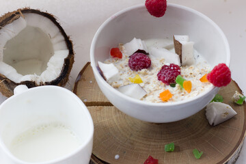 healthy Breakfast oatmeal porridge and fruit berries on a white background