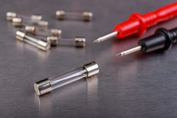 Measurement and control of glass electric fuses. Minor work in the electronics workshop.