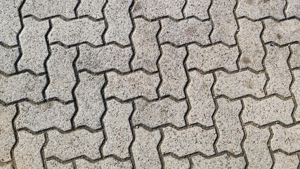 Tan street or sidewalk paver background (light).