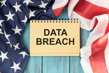 Fototapeta na wymiar text Data Breach on notepad with american flag background
