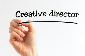 Hand writing inscription Creative director with marker, concept