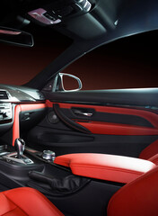 Modern luxury car Interior - steering wheel, shift lever and dashboard. Car interior luxury inside....