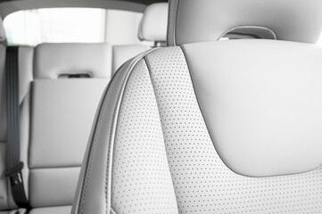 Modern sport car perforated red leather interior