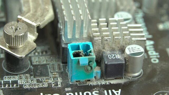The colored connectors in the computer are charred and burned after over-voltage. The wizard shows the processor power to the camera. Failure of the motherboard and power supply.