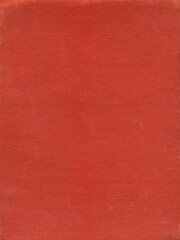 Textile texture. Red old book cover. Rough canvas surface. Blank retro page. Empty place for text. Perfect for background and vintage style design.
