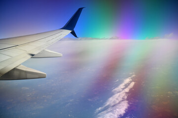 AIRPLANE/WING/CLOUDS