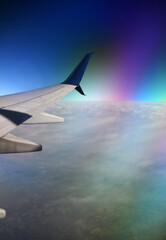 AIRPLANE/WING/CLOUDS