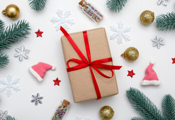 Flat lay New year Christmas layout with gift, stars, snowflakes and holiday decor on white background