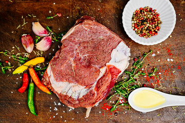 Raw chicken, pork and beef seasoned with spices and vegetables