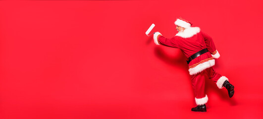 Santa Claus is getting ready for the season. - obrazy, fototapety, plakaty