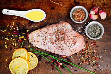 Raw chicken, pork and beef seasoned with spices and vegetables