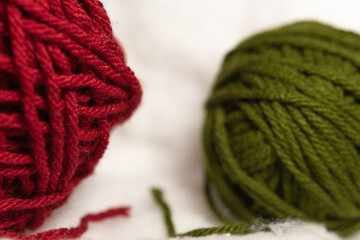 Red and green wool balls on Cotton Clouds