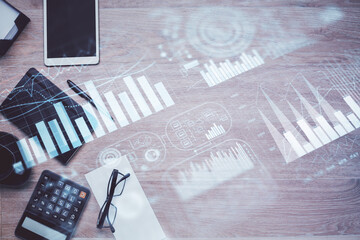 Double exposure of forex graph drawing and work table top veiw. Concept of financial analysis.