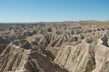 Fototapeta na wymiar Layered Rock formations, steep Canyons and towering Spires of Badlands National Park in South Dakota. USA.