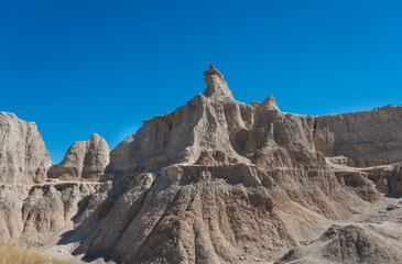 Layered Rock formations, steep Canyons and towering Spires of Badlands National Park in South Dakota. USA.