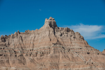 Fototapeta premium Layered Rock formations, steep Canyons and towering Spires of Badlands National Park in South Dakota. USA.