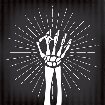 Human Skeleton Raised Hand Clenched into Fist in Front of Sunburst Halloween Comic Template - White on Black Background - Mixed Graphic Design