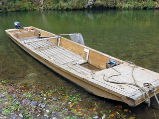 wooden boat on a river