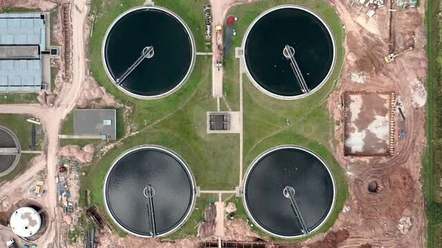Static top down aerial view on water treatment facility.