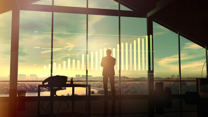 In a large office, a businessman looks at a growth graph at dawn.