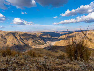 view of the city of huancavelica at sunset from a hill called san jeronimo in peru