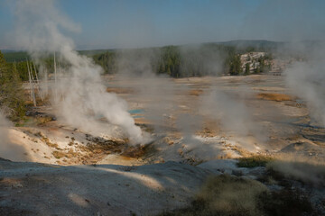 Hot Springs and gushing Geysers at Yellowstone National Park wilderness area atop a volcanic hot spot. USA.