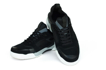 Black men's sneakers with white soles isolated on white