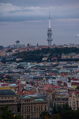 
panoramic view of Prague and roofs of Prague buildings at sunset in the Czech Republic