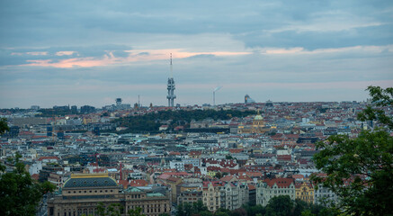 
panoramic view of Prague and roofs of Prague buildings at sunset in the Czech Republic