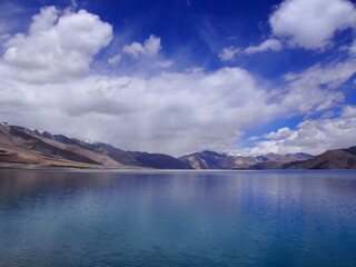 Beautiful lake and magnificent blue skies and mountains, Pangong tso (Lake), Durbuk, Leh, Ladakh, Jammu and Kashmir, India