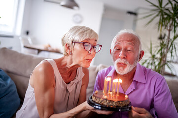 Senior couple celebrating birthday