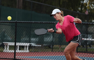 pickleball senior competes in a tournament.