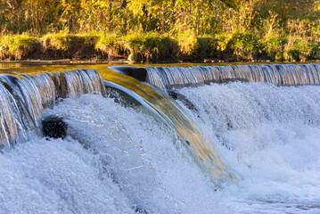 Old Mill dam at Humber River in Autumn, Toronto, Ontario, Canada