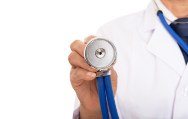 Close-up of doctor preparing to auscultate holding stethoscope in hand