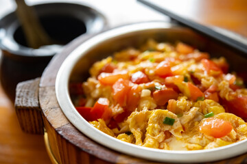 side view fast food of fried egg with tomatoes with bowl of soup
