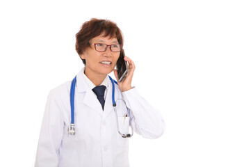 Fototapeta premium Female doctor in front of white background is answering the phone