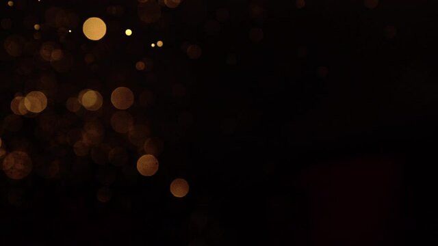 High-speed shooting of shining gold foil and gleaming slow motion